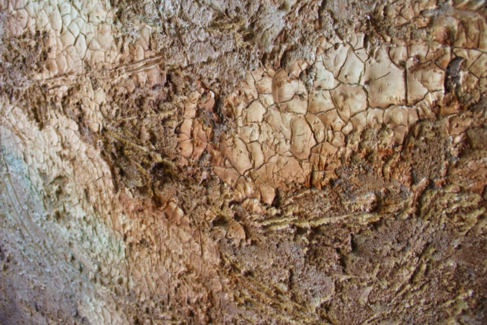 Close up detail of brown and tan crackle textured porcelain surface, Emancipation chamber
