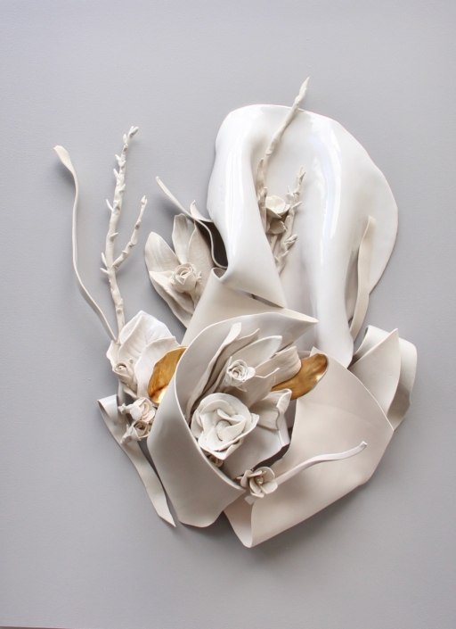 Tall white porcelain wall sculpture with a rose cluster and swirling ribbon forms, Fleurs de Perse series
